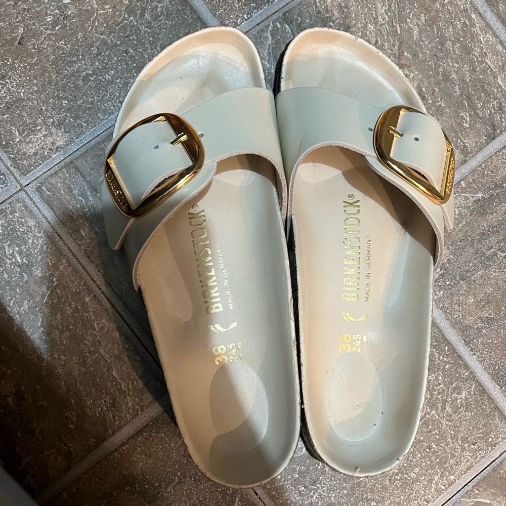 Cream Birkenstocks sandals, gold buckle